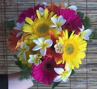 Photo:  tropical looking gerbera daisy wedding bouquet.